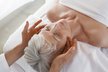 SENIOR WOMAN MASSAGE